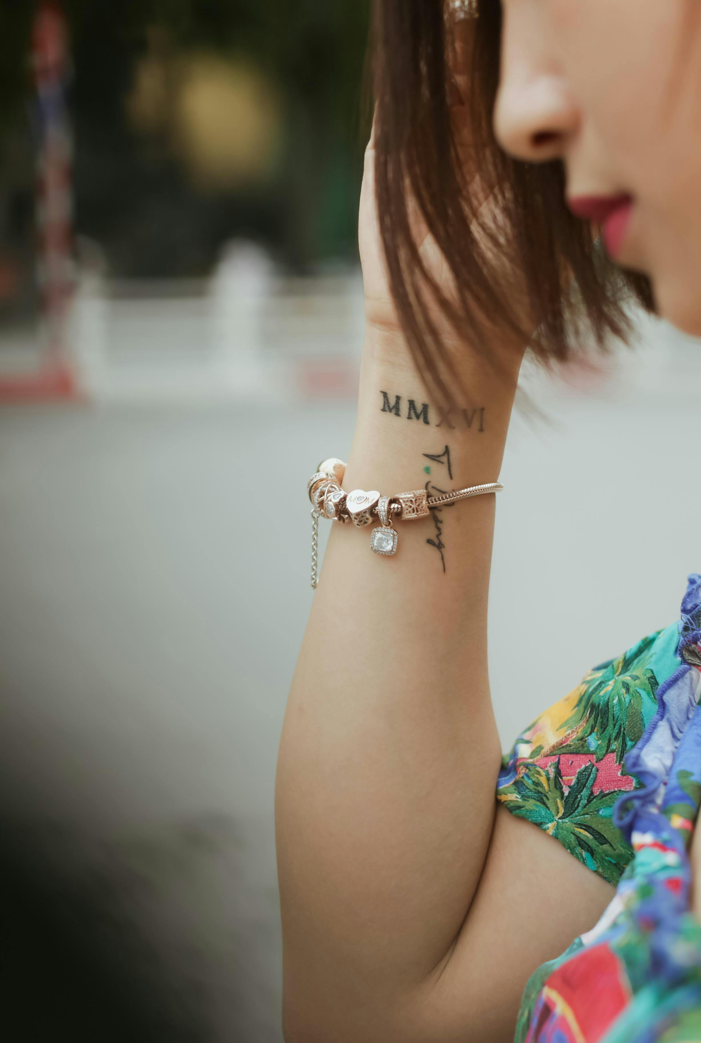 Rose tattoo on shoulder